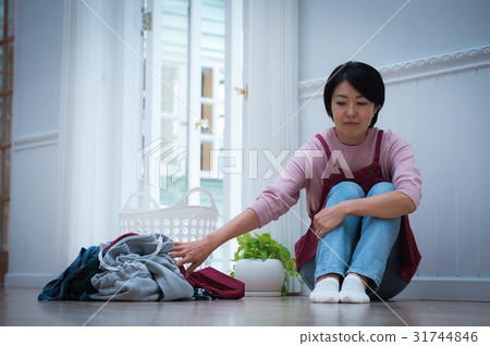 Middle women tired from chores 31744846