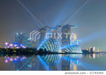 Singapore - September 19, 2014 Marina Bay Sands with lasers show Singapore - September 19, 2014 Marina Bay Sands with lasers show 31745944