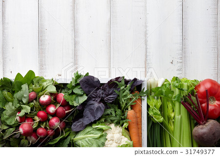 Fresh vegetables and herbs in wooden box 31749377
