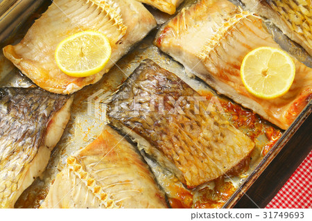 Oven baked carp fillets 31749693