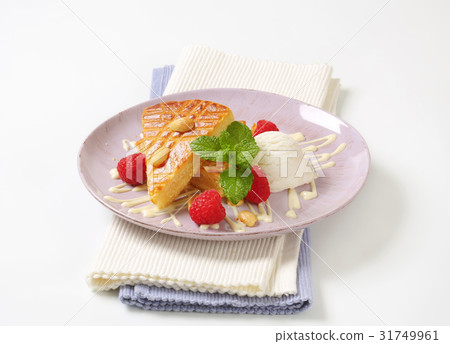 Almond cake with ice cream and raspberries Almond cake with ice cream and raspberries 31749961