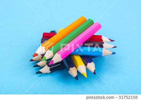 Stationery: colored pencils on blue background. Stationery: colored pencils on blue background. 31752150