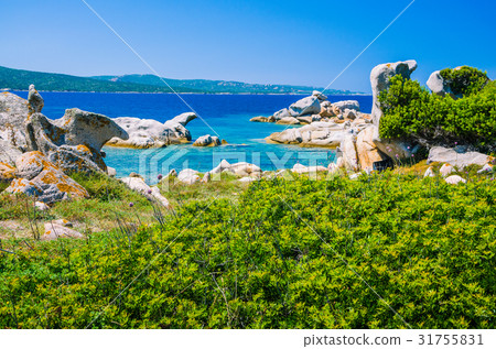 Costline with granite rocks and azure water near 31755831