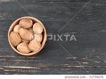 Nutmeg in bowl Nutmeg in bowl 31756076