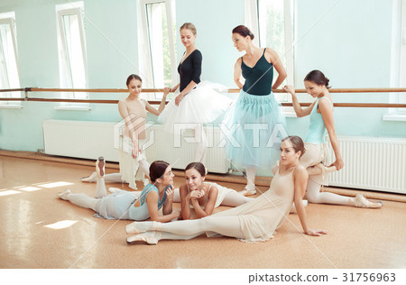 The seven ballerinas at ballet bar The seven ballerinas at ballet bar 31756963