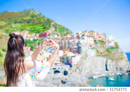 Beautiful girl making with hands heart shape on Beautiful girl making with hands heart shape on 31758775