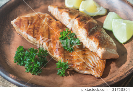 Roasted salmon steak with fresh parsley Roasted salmon steak with fresh parsley 31758804