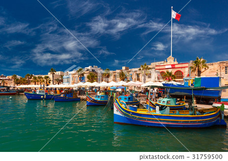 Taditional eyed boats Luzzu in Marsaxlokk, Malta 31759500