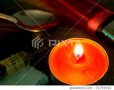 Cocaine inserts are placed on a wooden table Cocaine inserts are placed on a wooden table 31759592