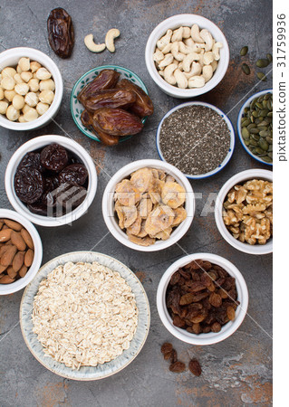 Ingredients for homemade granola on the grey 31759936