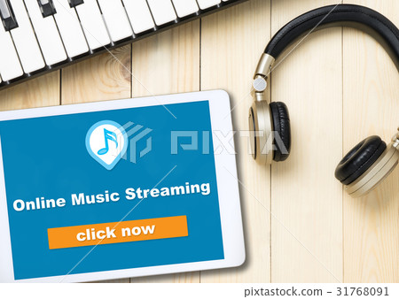 Online Music streaming button on tablet screen 31768091