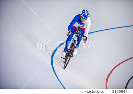 Racing cyclist on velodrome outdoor. 31769474