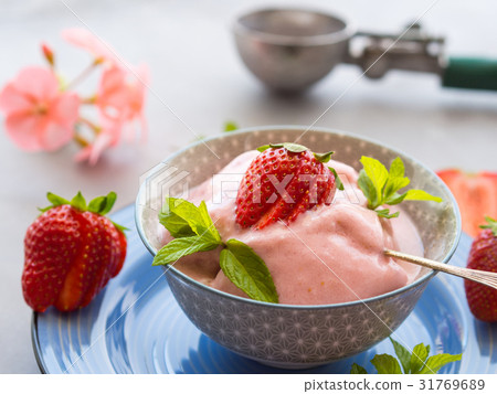 Home made strawberry ice cream in bowl Home made strawberry ice cream in bowl 31769689