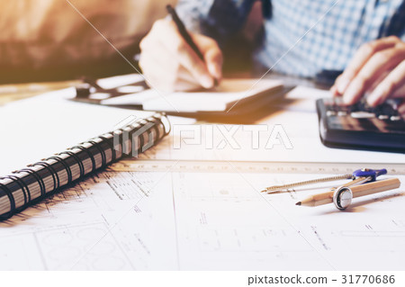 Architect engineer man calculate building area Architect engineer man calculate building area 31770686