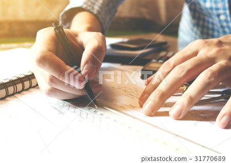 Architect man working with drawing compass Architect man working with drawing compass 31770689