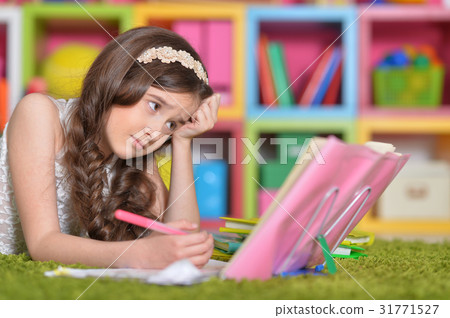 cute girl doing homework cute girl doing homework 31771527
