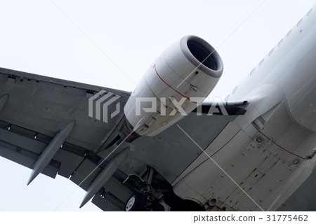 The underside of a modern airplane with its flaps The underside of a modern airplane with its flaps 31775462