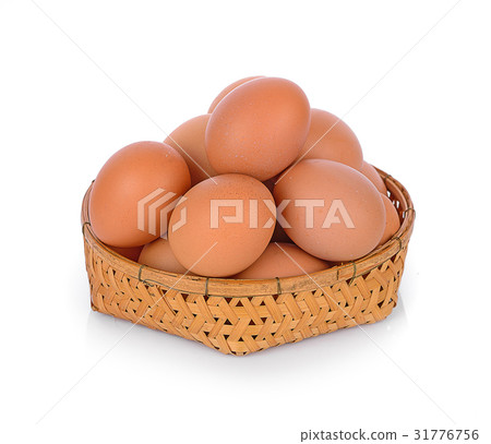 eggs in basket on white background 31776756