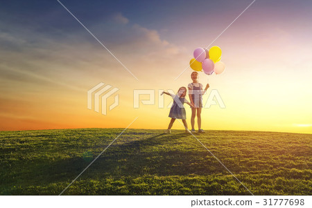 children are playing with balloons children are playing with balloons 31777698
