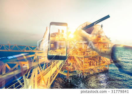 Double exposure of refinery oil and gas background 31779841