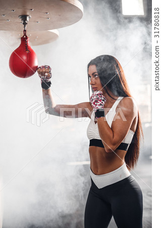 Beautiful woman with the pink boxing wraps 31780818