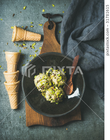 Homemade pistachio ice cream scoops with crashed 31781615