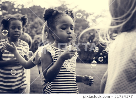 Group of Diverse Kids Playing at the Field Together Group of Diverse Kids Playing at the Field Together 31784177