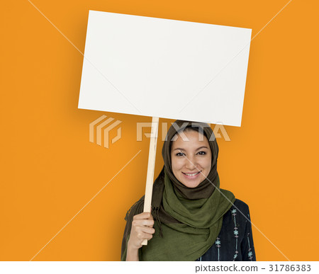 Arabian Woman Face Covered with Hijab Holding Board Sign Studio Portrait 31786383