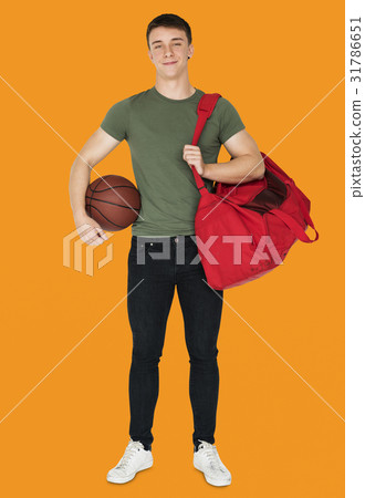 Young adult muscular man holding basketball Young adult muscular man holding basketball 31786651