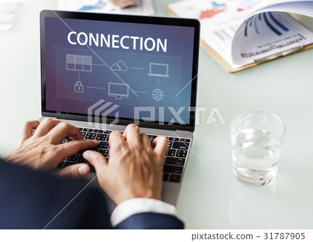 Hands working on laptop network connection graphic overlay Hands working on laptop network connection graphic overlay 31787905