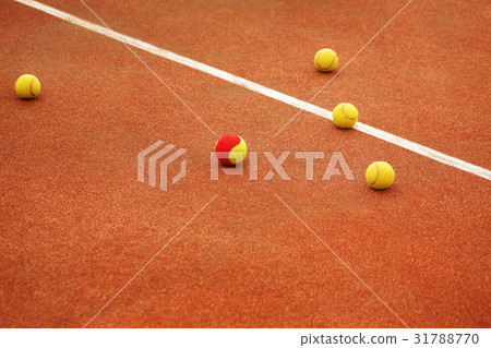 Ball on tennis court background 31788770