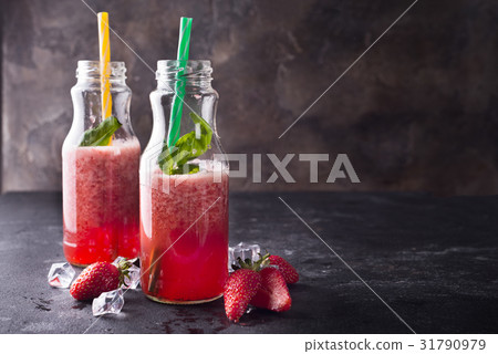 Strawberry smoothies in bottles Strawberry smoothies in bottles 31790979
