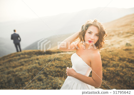 Happy beautiful wedding couple bride and groom at Happy beautiful wedding couple bride and groom at 31795642