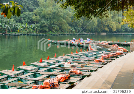 The small travel boat's pier of Tam Coc The small travel boat's pier of Tam Coc 31796229