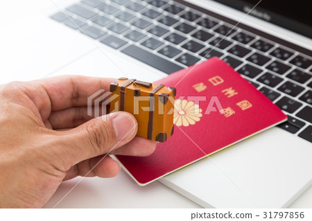 Passport and laptop computer and travel bag Passport and laptop computer and travel bag 31797856