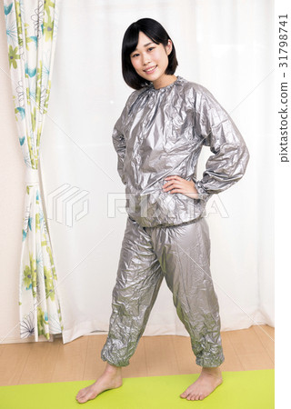 A woman in a sauna suit A woman in a sauna suit 31798741