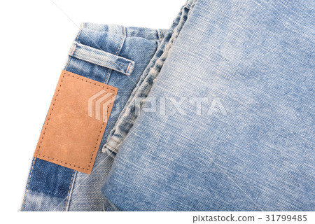 Jeans with leather label isolated on white Jeans with leather label isolated on white 31799485