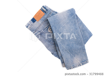 Blue jeans with leather label isolated on white Blue jeans with leather label isolated on white 31799488