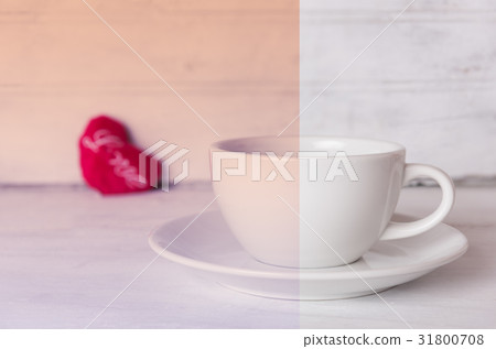 Coffee cup and red heart on wooden background 31800708