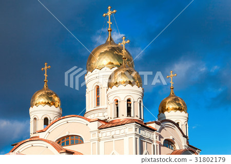 White orthodox church with golden domes White orthodox church with golden domes 31802179