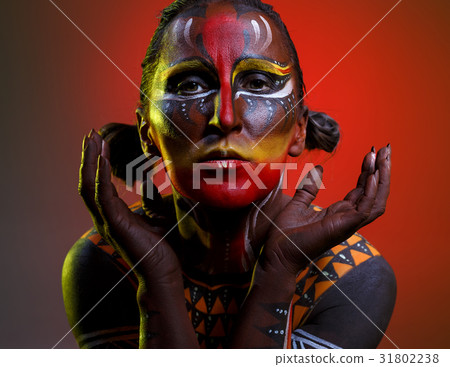 Bodypainting. Woman painted with ethnic patterns 31802238