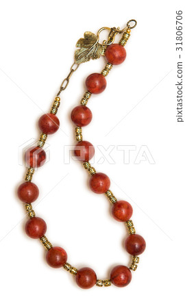 Nice necklace with red beads isolated on white Nice necklace with red beads isolated on white 31806706