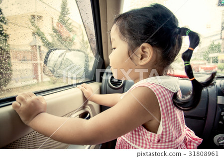 Child little girl looking the rain falling Child little girl looking the rain falling 31808961