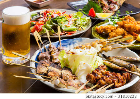 Draft beer and yakitori Draft beer and yakitori 31810228