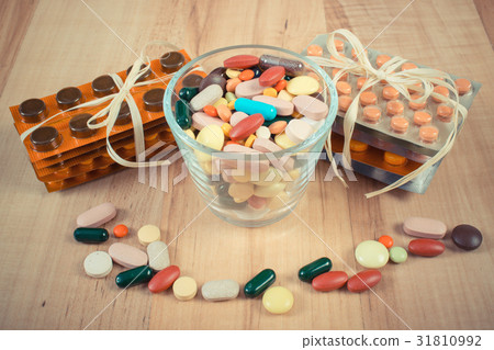 Vintage photo, Heap of colorful medical pills 31810992