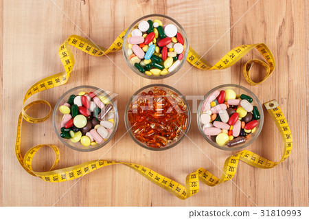 Colorful medical capsules with centimeter 31810993