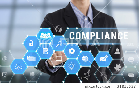 Businessman hand pressing button Compliance.  31813538