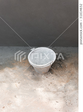 Pail for cement work on concrete background Pail for cement work on concrete background 31814632