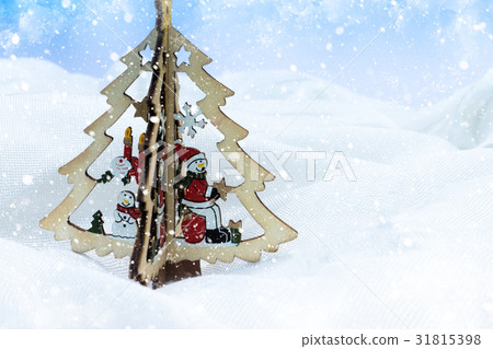 wood snowman on the Christmas tree with light and wood snowman on the Christmas tree with light and 31815398