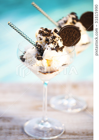Vanilla sundae ice cream with chocolate sauce and  31815990